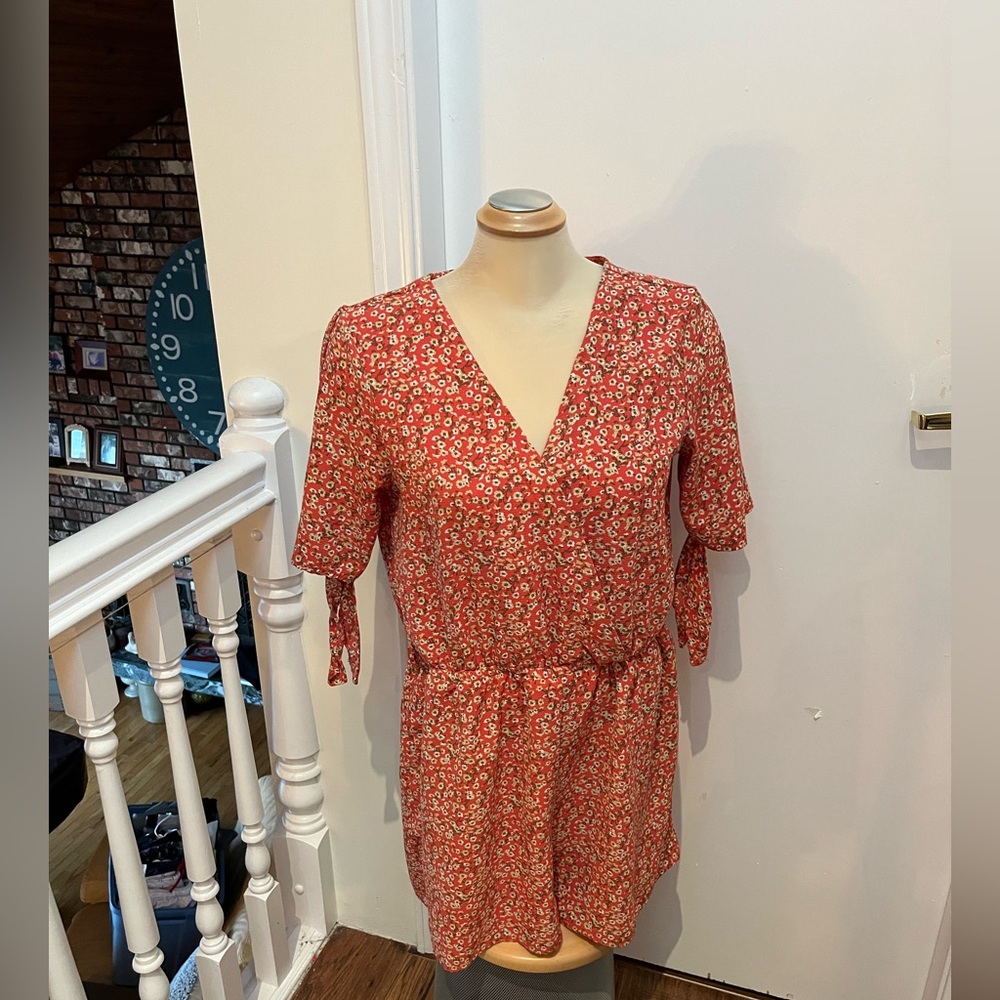 Floral orange V-Neck Romper.